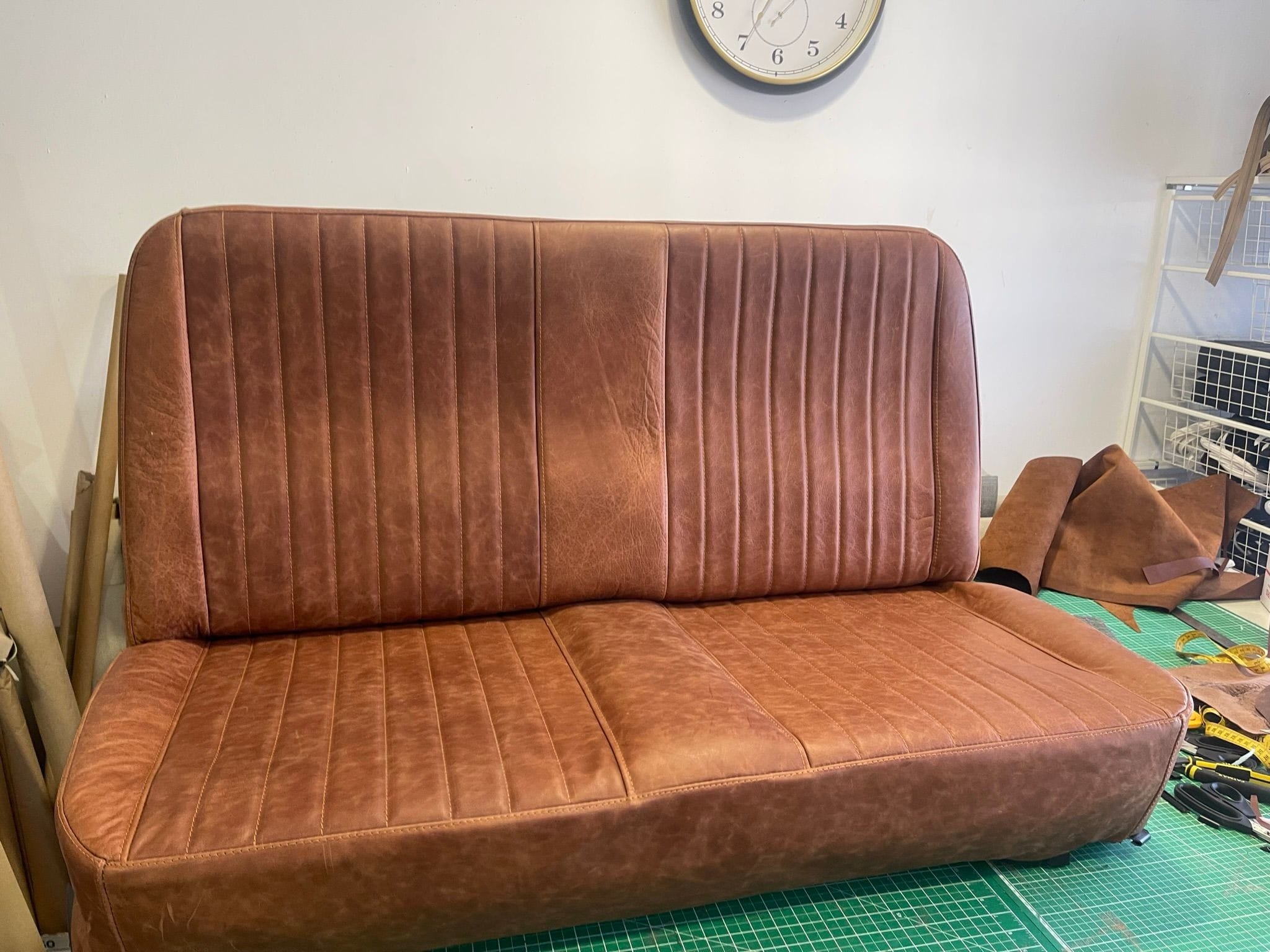 Distressed leather seat in Copper colour