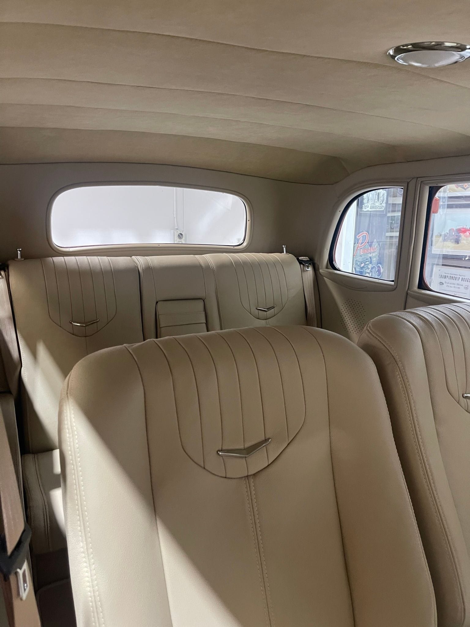 1934 Sedan hotrod interior with seat medallions from Krist Kustoms in USA